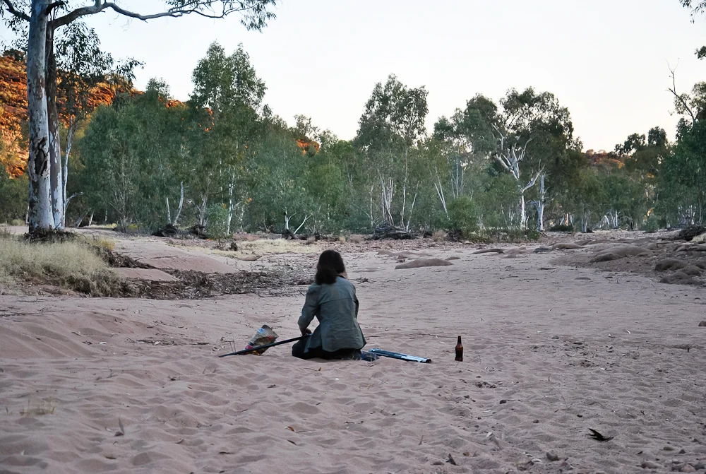 Rebecca Sullivan, one of my volunteers, fixing dragon nooses in the middle of the Finke "River". 