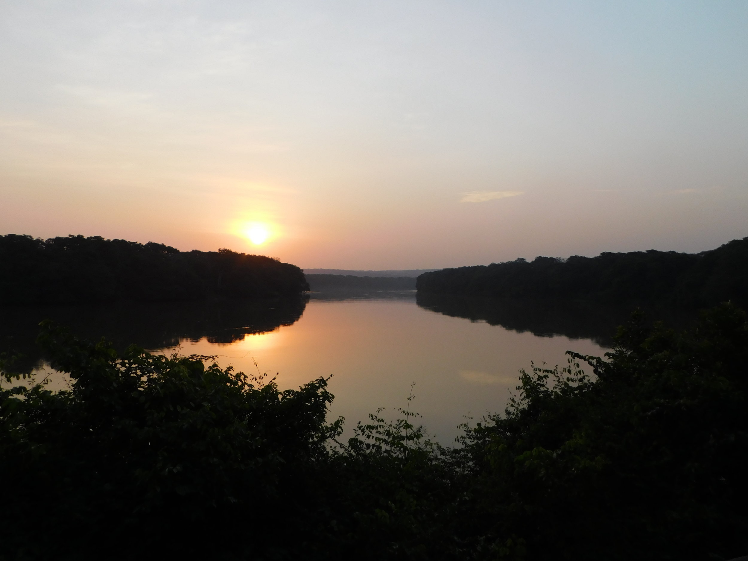 Sunset over the Sangha River from deck at Sangha Lodge.