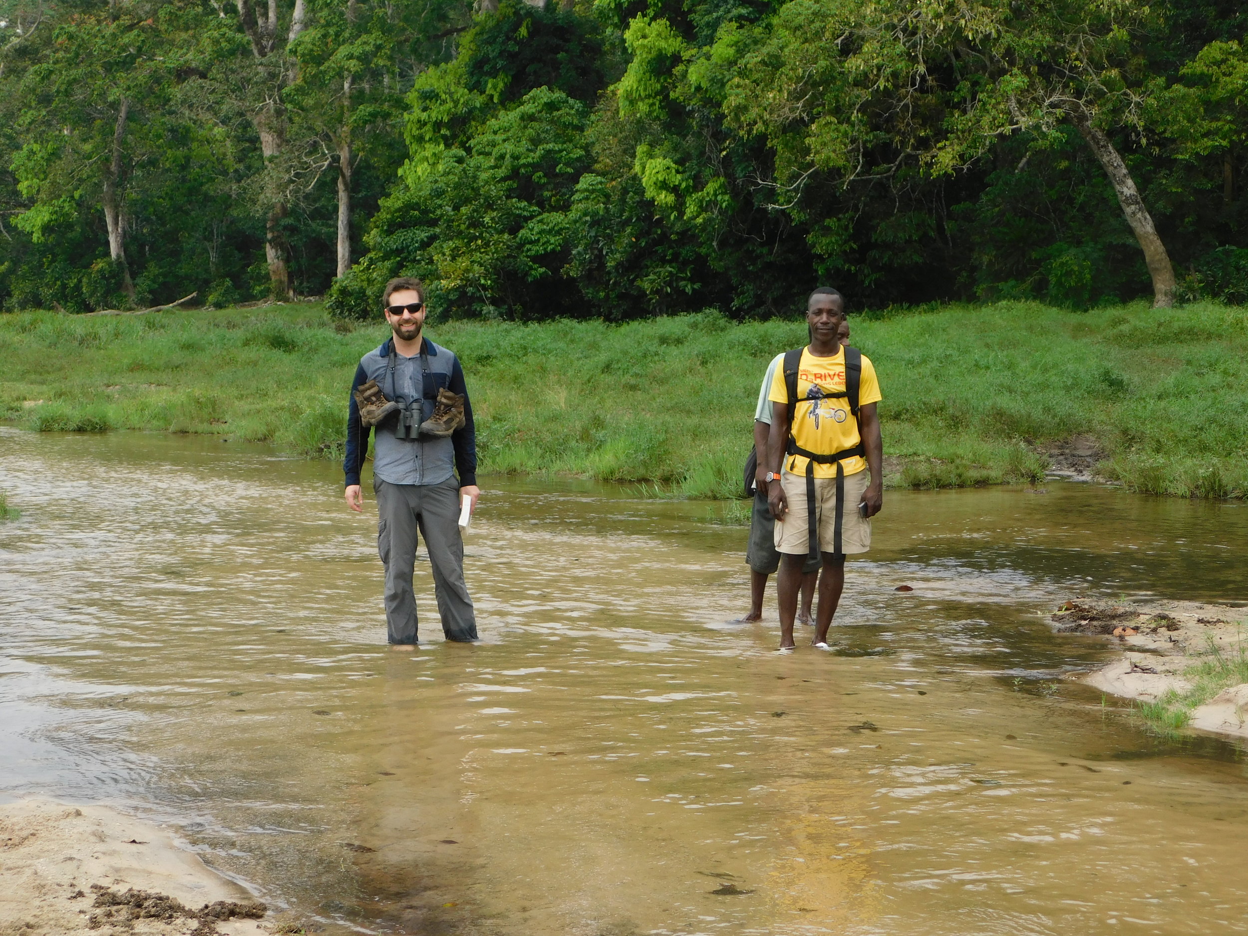 Wading with bare feet through the creek in Bai Hokou. This is not a recommended activity , next time I would bring water shoes or sandals.