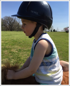President Nordstrom’s grandson Roman Parker on Easter riding Spirit. Next year leadline classes!
