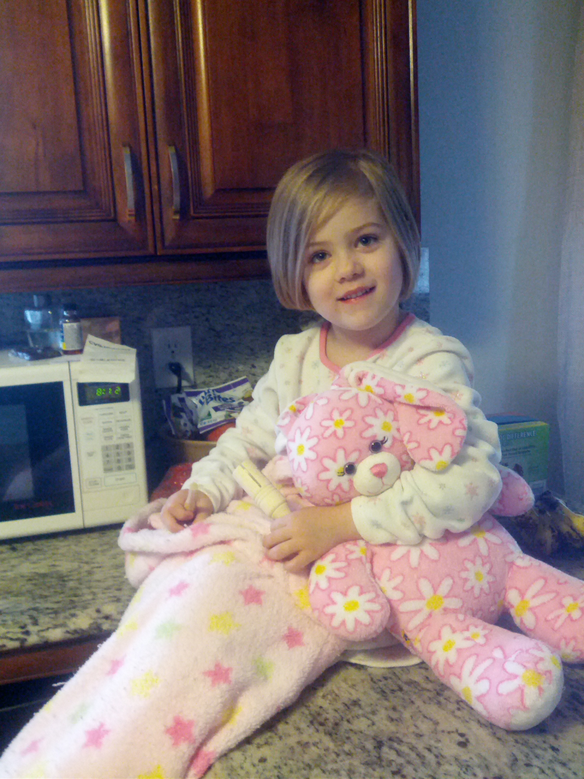 Here's my sweet girl ready to help make her own breakfast.