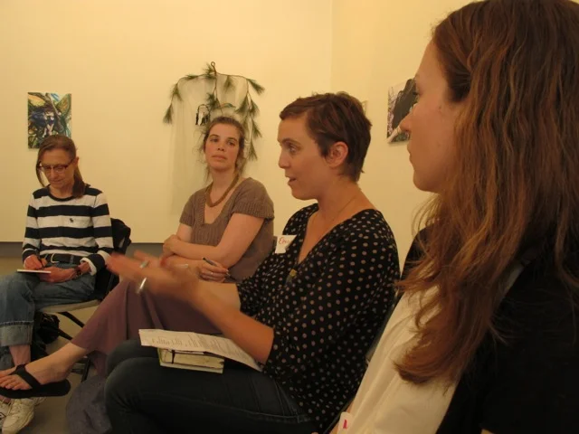 That's Eleanor, second from the right. And Molly, far right! Jerusha Robinson, one of our knitting teachers, is second from the left.
