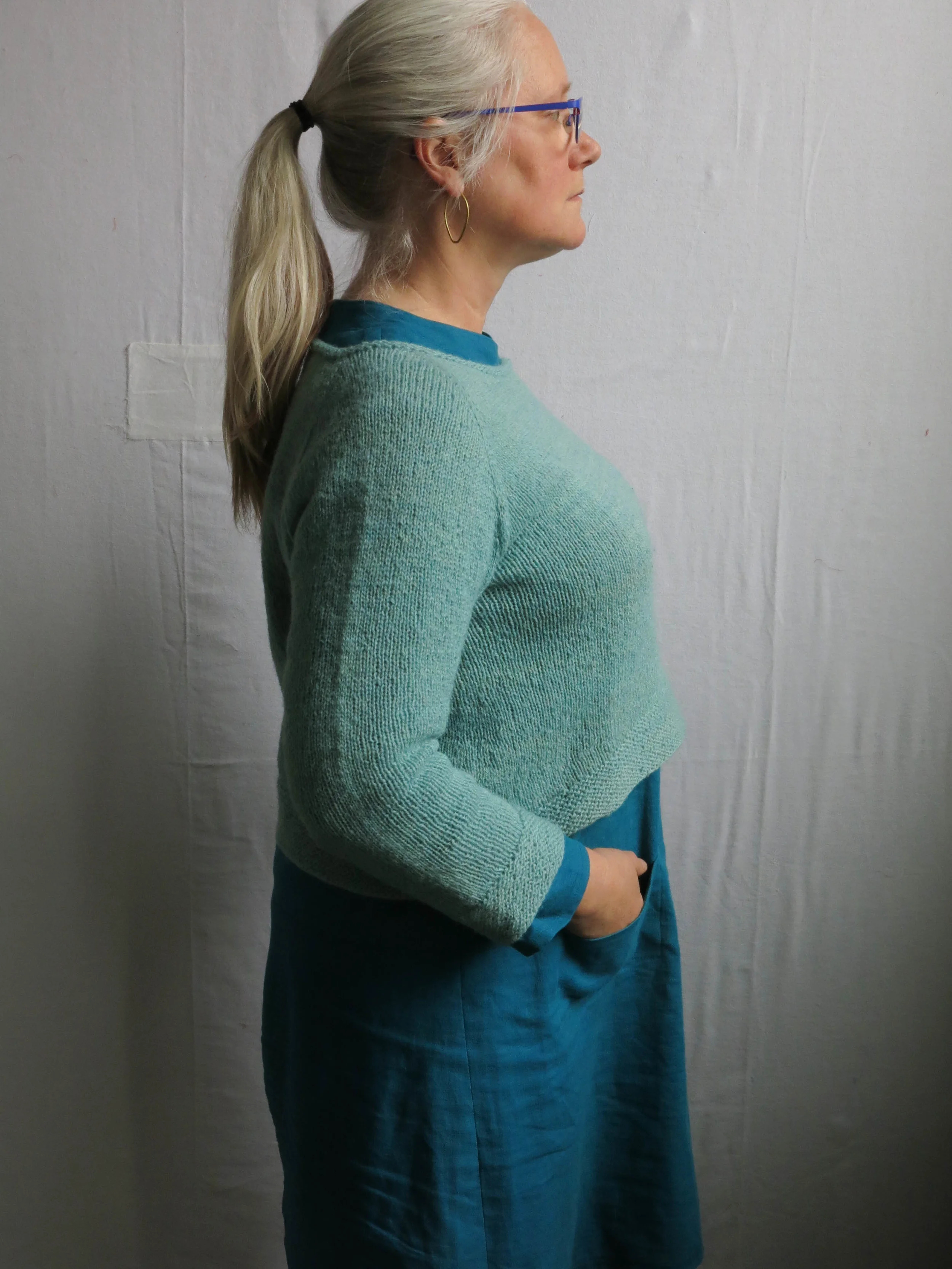 A Lila top down sweater, pattern by Carrie Bostick Hoge, knit up in Starcroft Fiber's Nash Island Tide yarn, over a Union dress, pattern by Merchant and Mills, in linen purchased in NYC years ago....