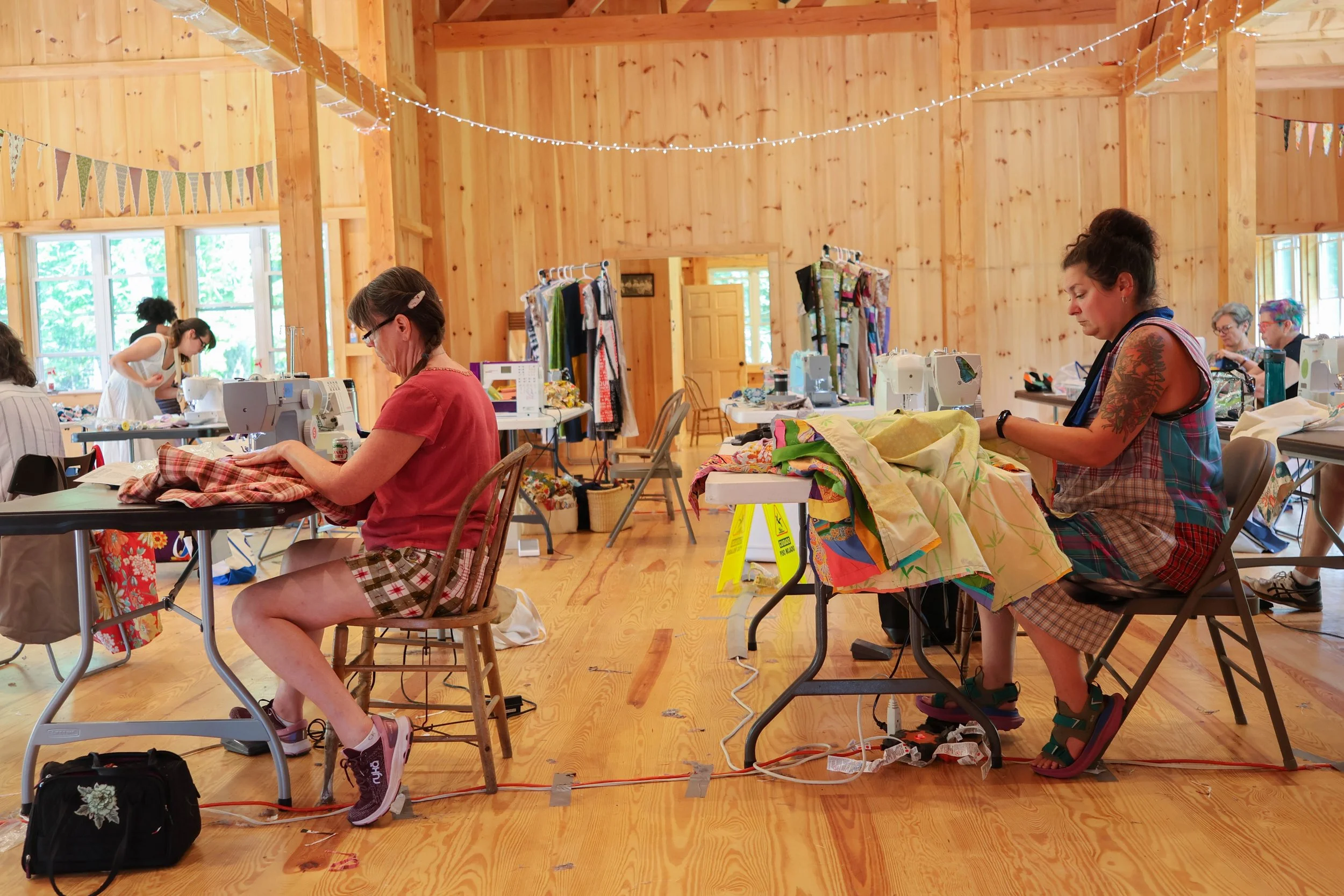 Karen, Christine at machines in barn.jpg
