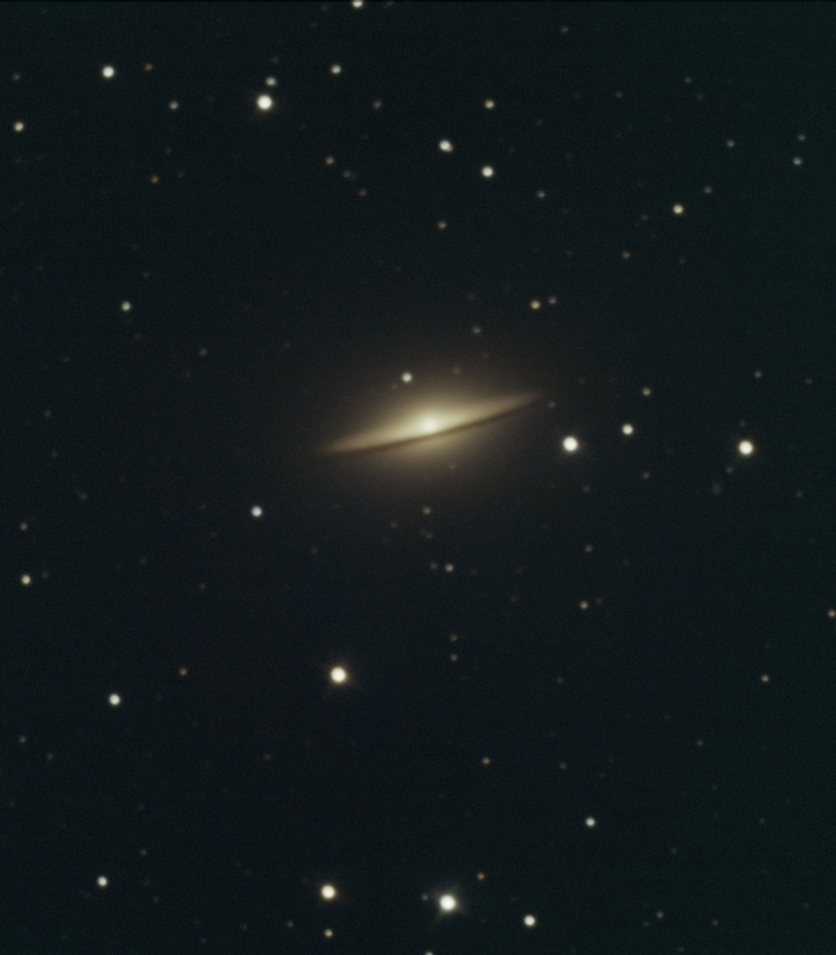This galaxy is pretty small (30million light yrs away) for a backyard astrophotographer but it's a fun target. If you want to see a mind blowing image of this one, google: hubble IR sombrero. My image is under 2hours of exposure. L=40min R=22 G=22 B=22.