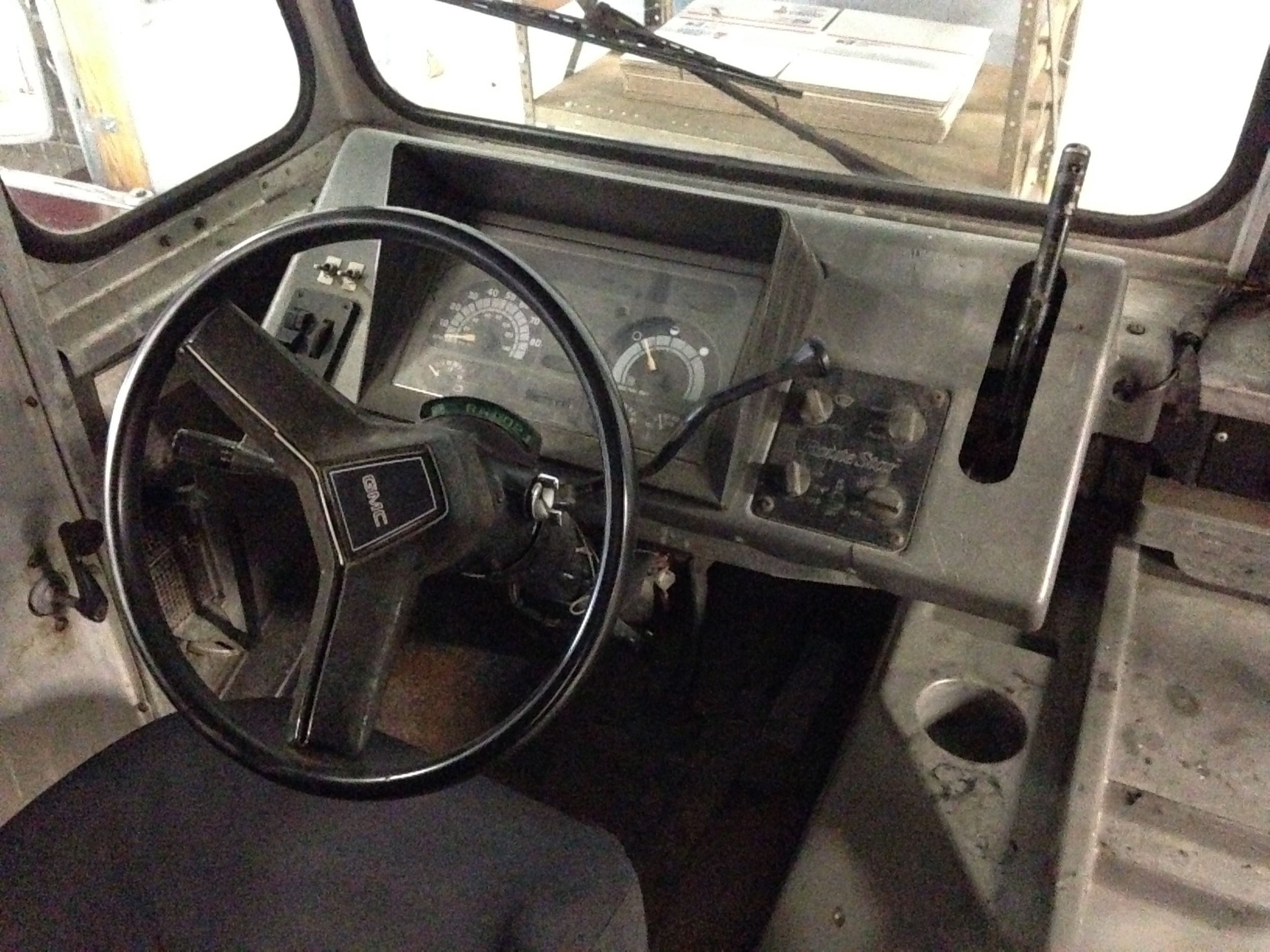 the whole dash is aluminum with some plastic/metal/glass fixtures. Needs a good cleaning.