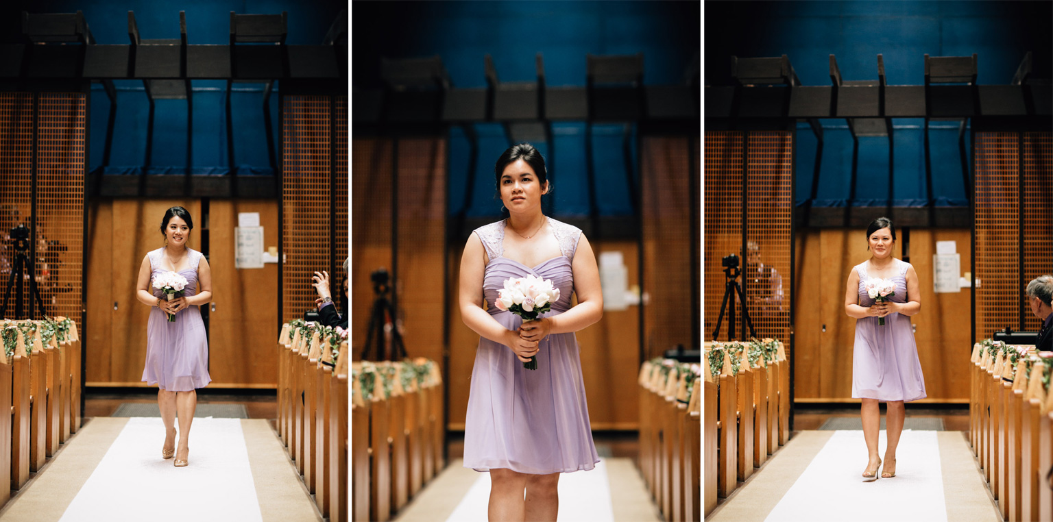 bridesmaids walking down aisle at redeemer lutheran church
