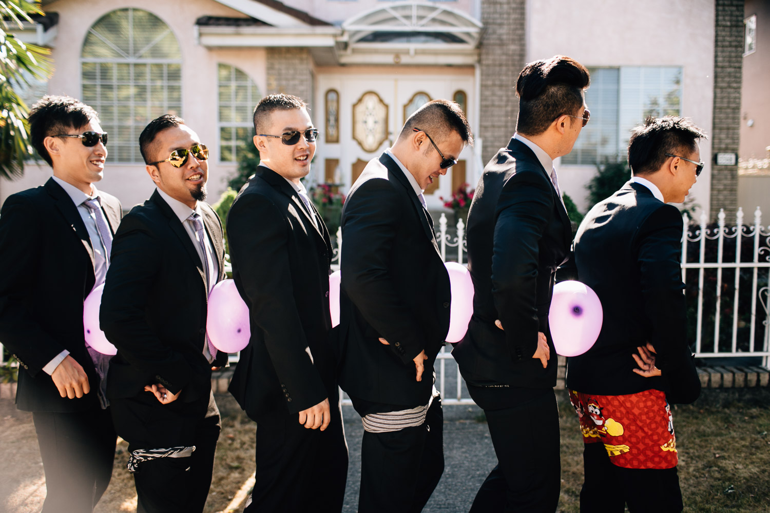 groomsmen chinese door games candid vancouver wedding photographer