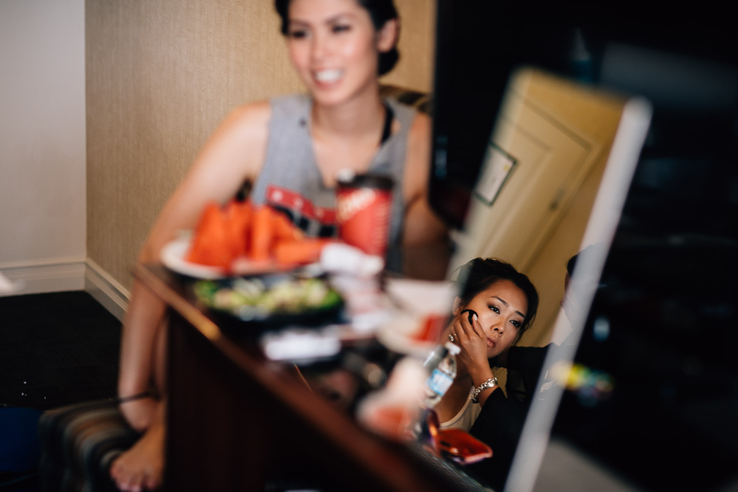 bridesmaid getting ready in surrey for wedding photography
