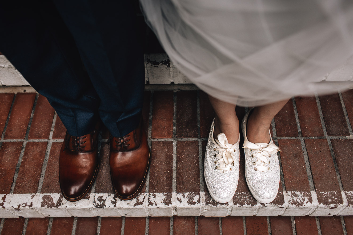 bride and groom shoes at brockhouse restaurant vancouver wedding photography