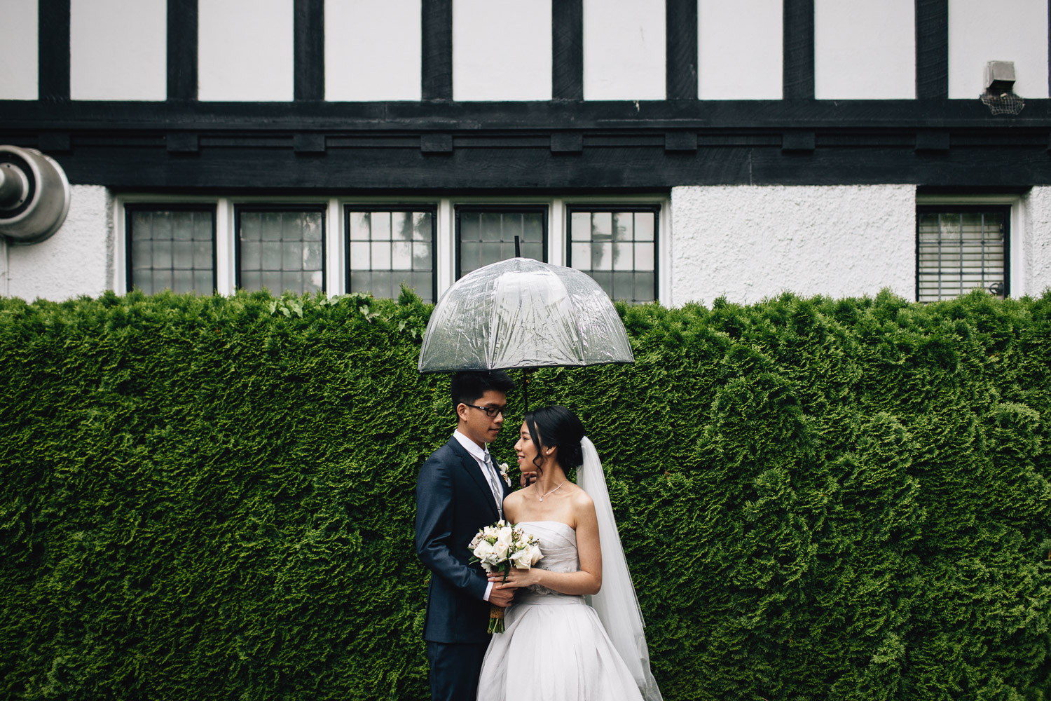 rainy summer wedding in vancouver at brockhouse restaurant clear umbrella photography