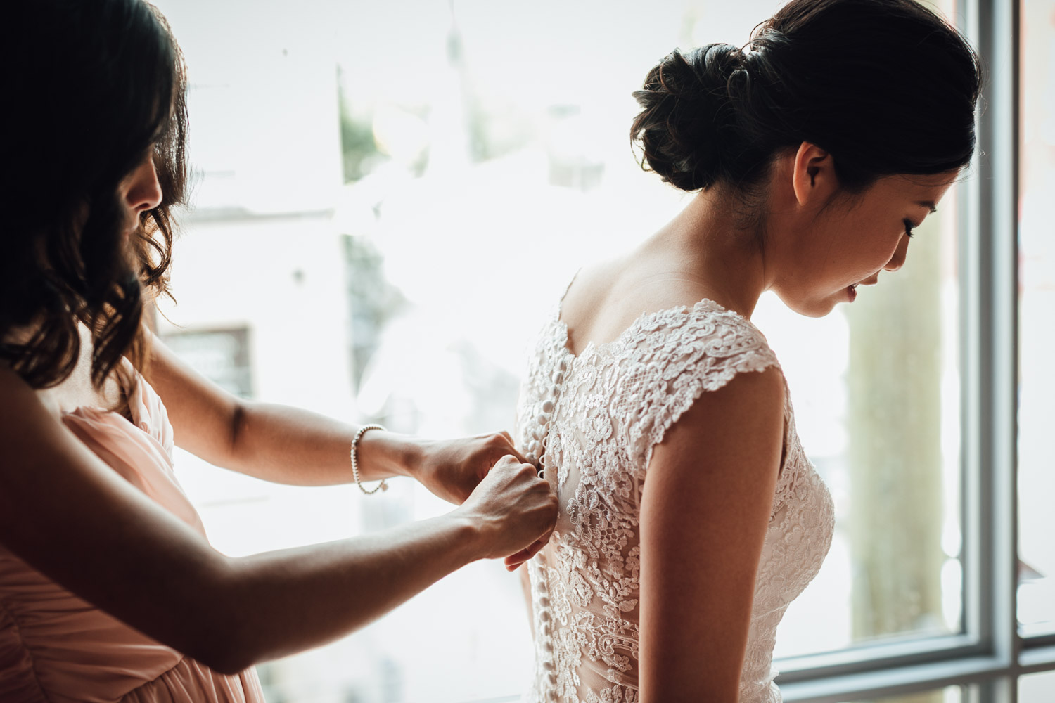 buttoning up dress candid bride yaletown in opus hotel wedding