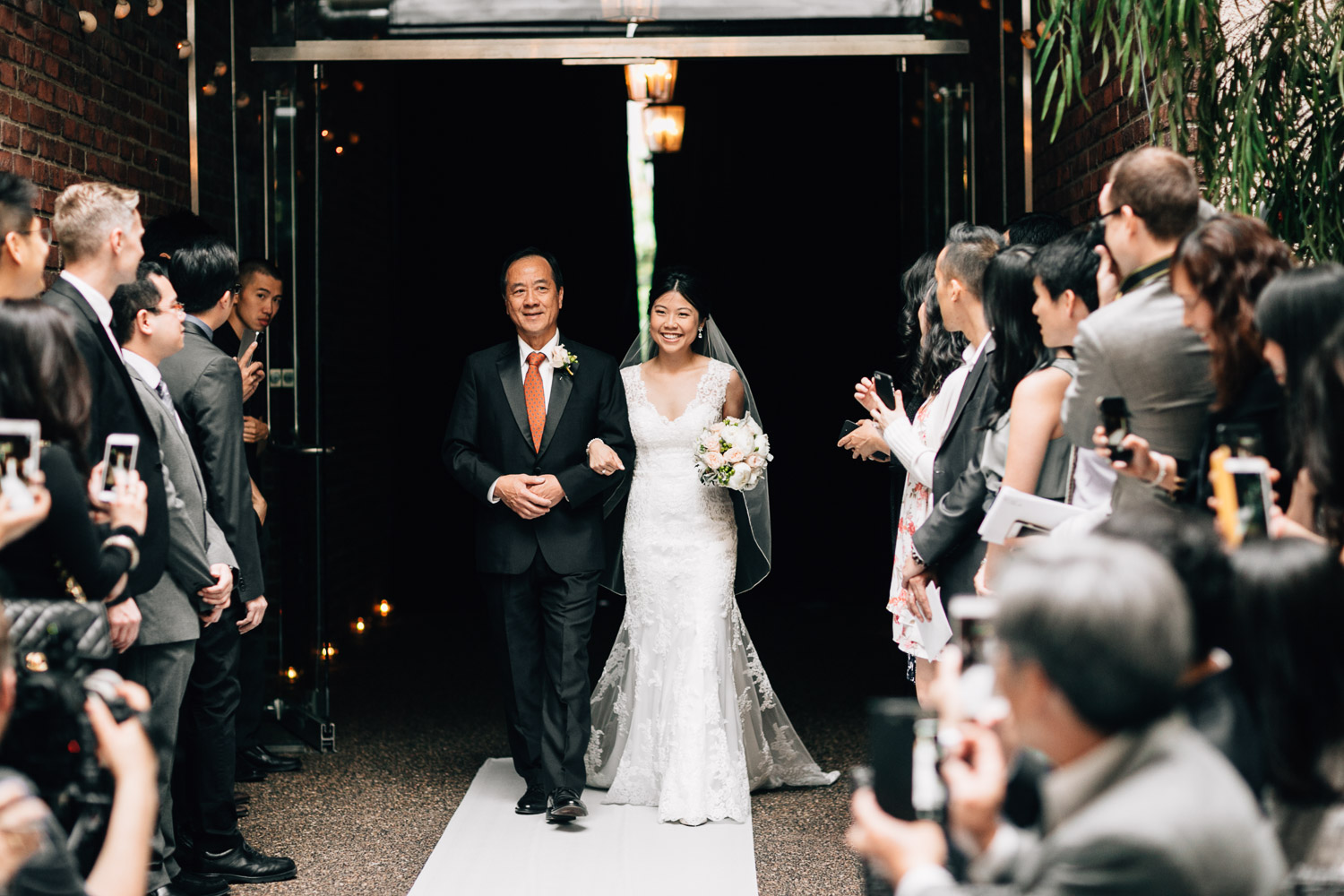 bride walking down aisle at brix and mortar yaletown vancouver