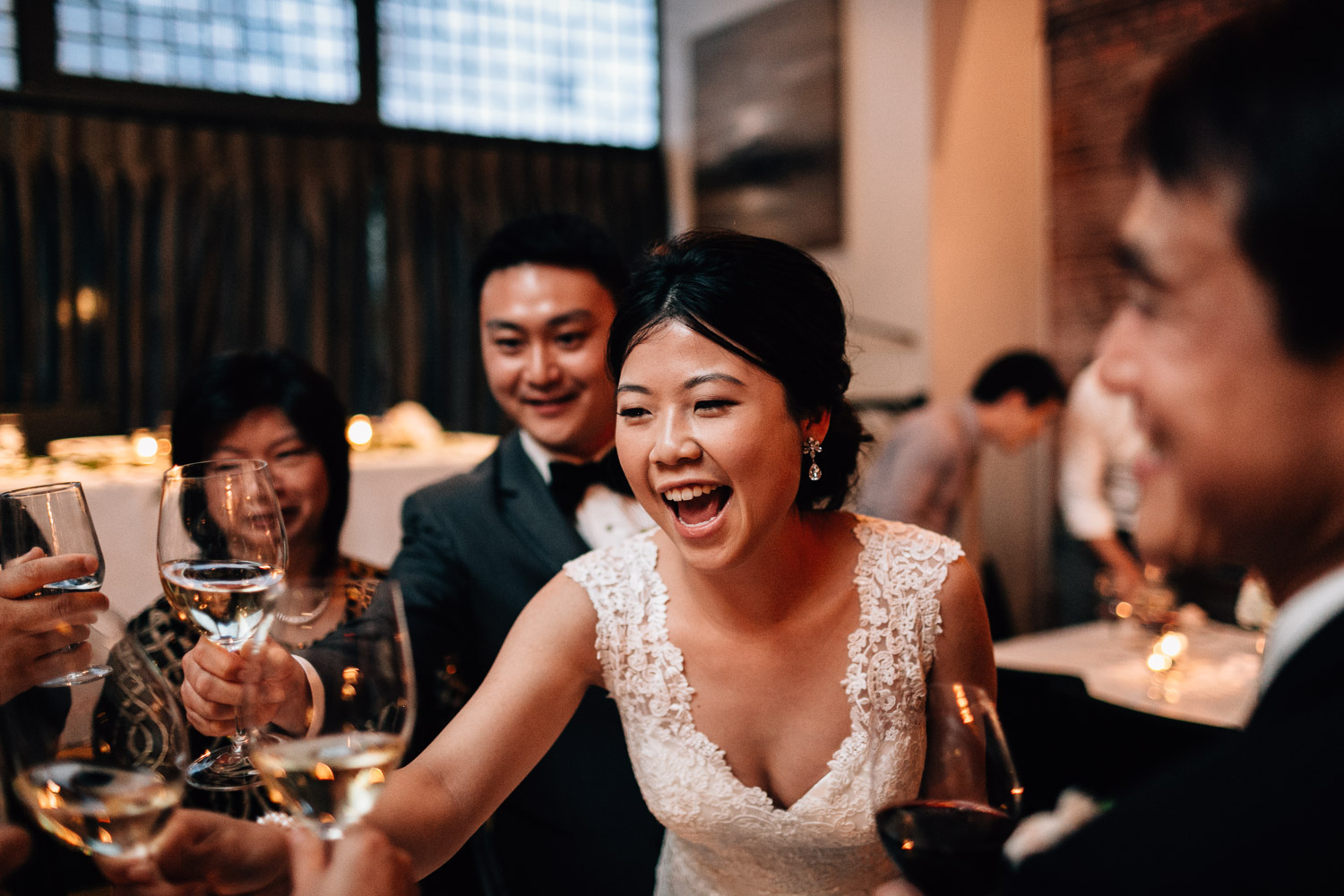 table toasting asian tradition wedding at brix and mortar yaletown