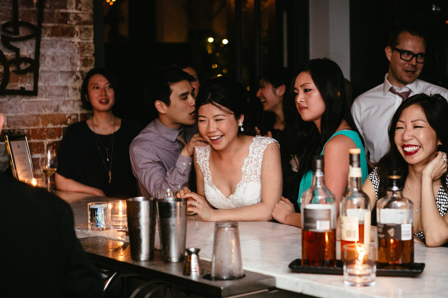 bride at bar in brix and mortar vancouver wedding photography
