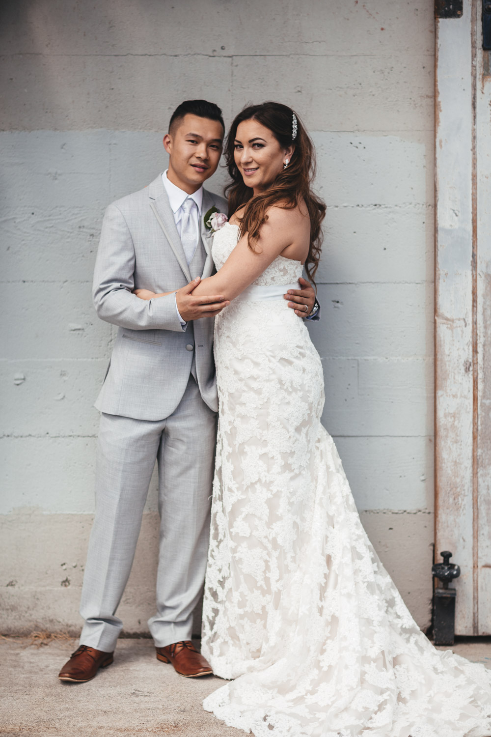 bride and groom in north vancouver wedding at burrard dry dock pier photography