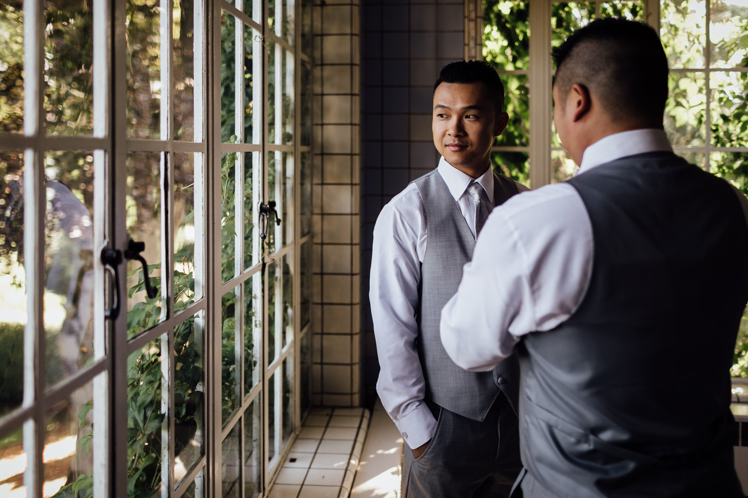 groom getting ready at hycroft in vancouver bc for wedding photography