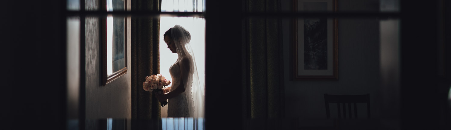 bride portrait at holiday inn on west broadway in vancouver