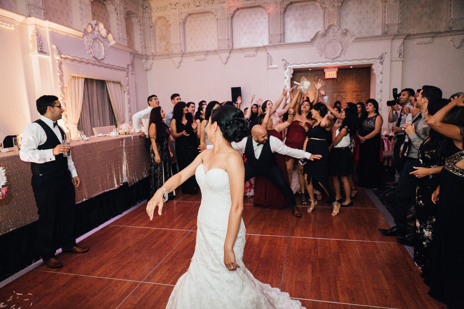 rosewood hotel georgia wedding reception photography bouquet toss in vancouver bc
