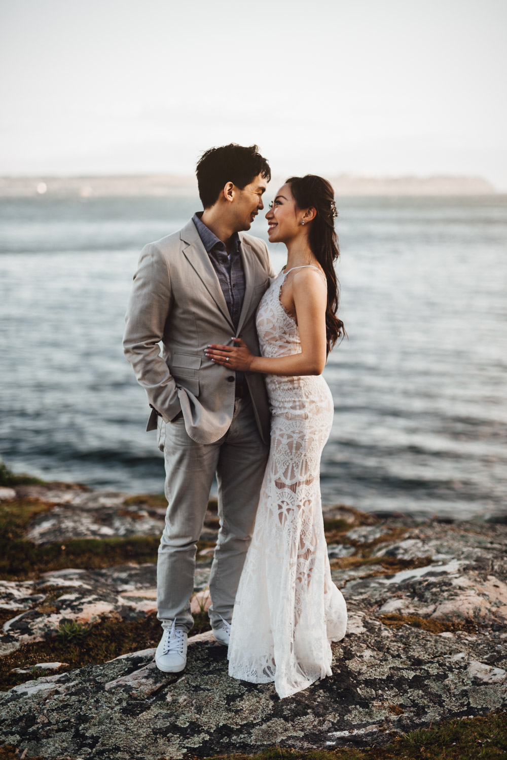 west vancouver engagement photography rocks water and sunset during golden hour