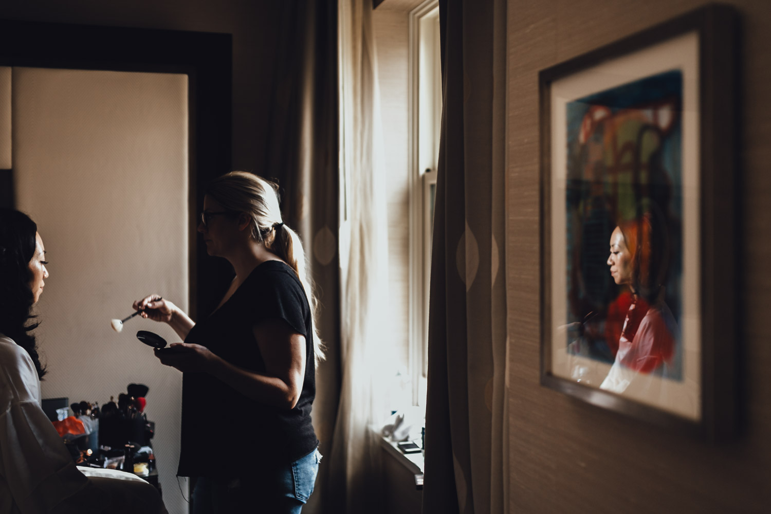vancouver wedding photographer at rosewood hotel georgia bride getting ready reflection