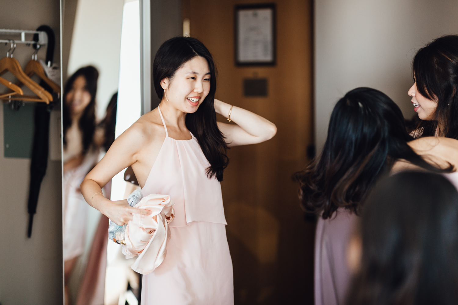 bride getting ready at auberge hotel in Coal Harbour, Vancouver BC wedding photography