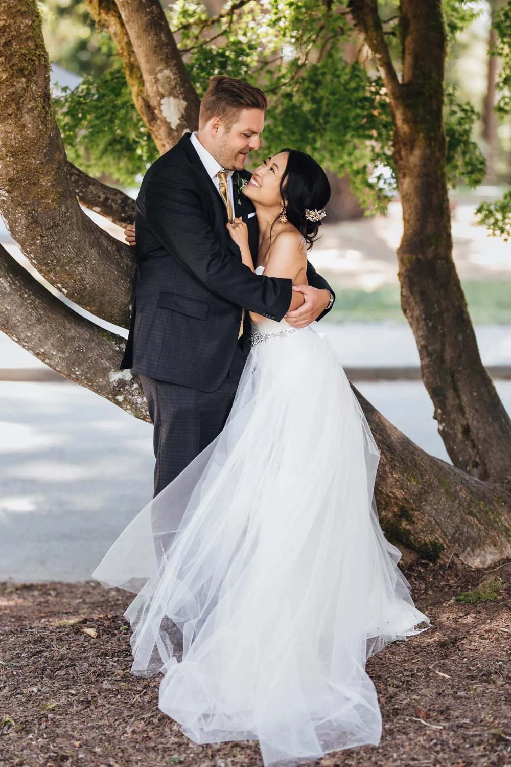 bride and groom at cleveland dam in north vancouver bc wedding photography
