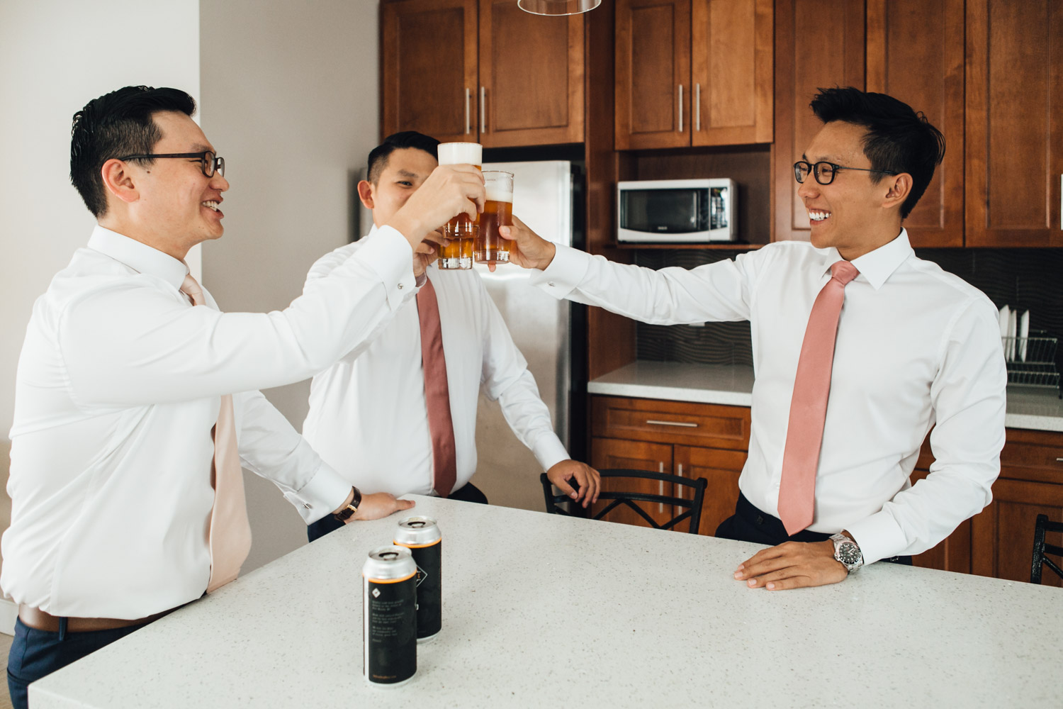 groom and groomsmen beer cheers singapore getting ready wedding photography