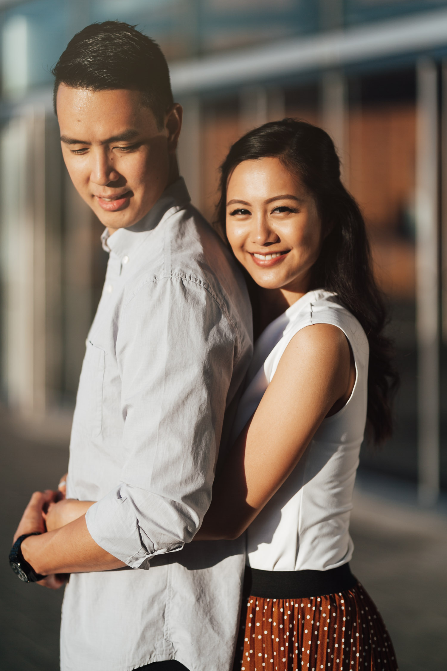 coal harbour engagement photography in vancouver bc during sunset marine building