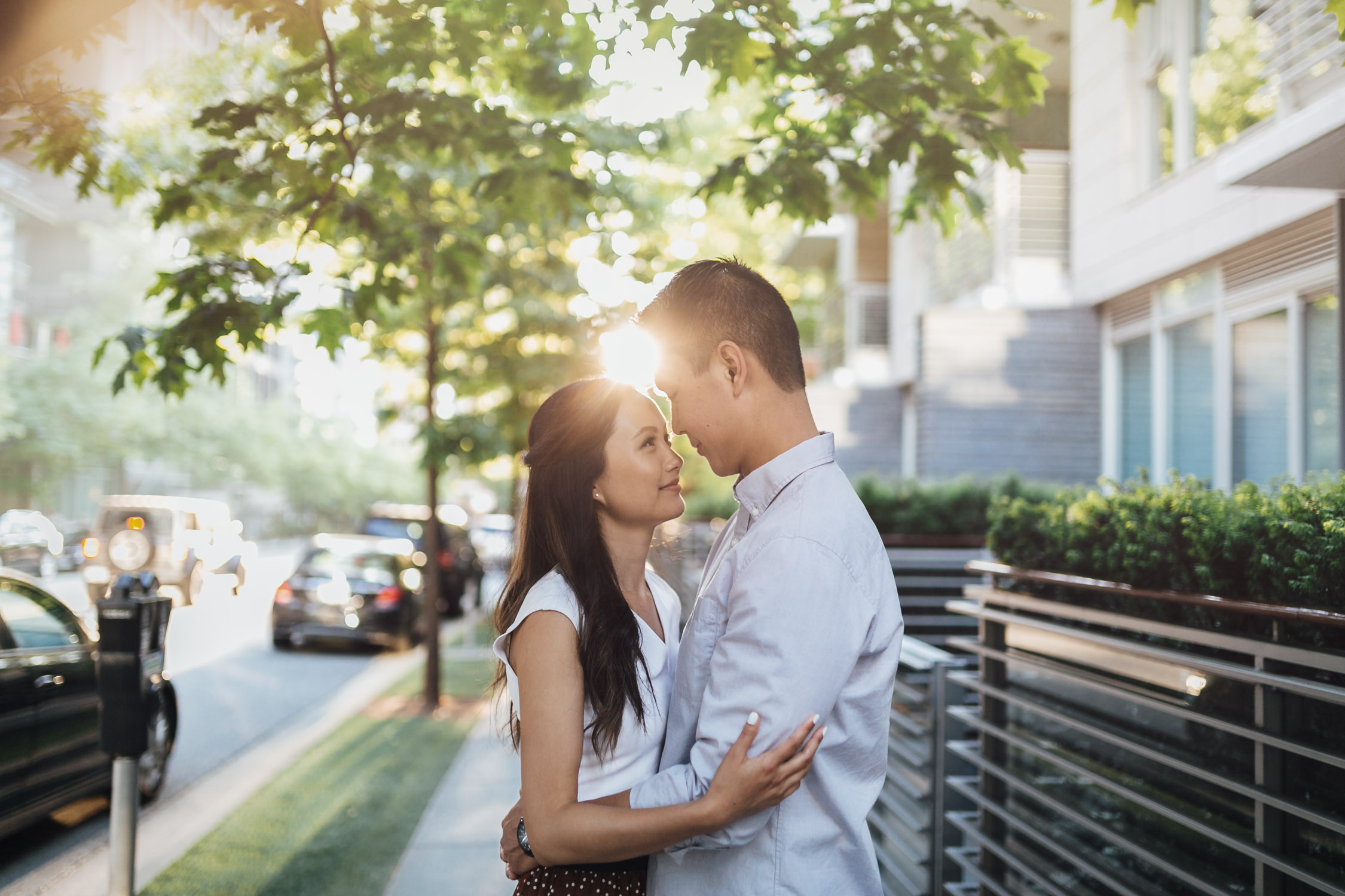 coal harbour engagement photography in vancouver bc during sunset marine building