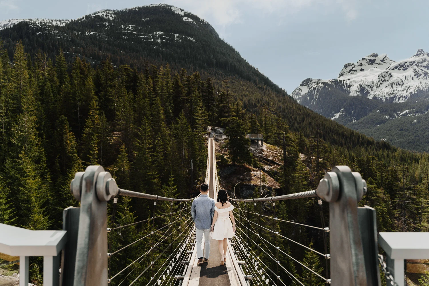sea to sky gondola engagement photography suspension bridge during spring