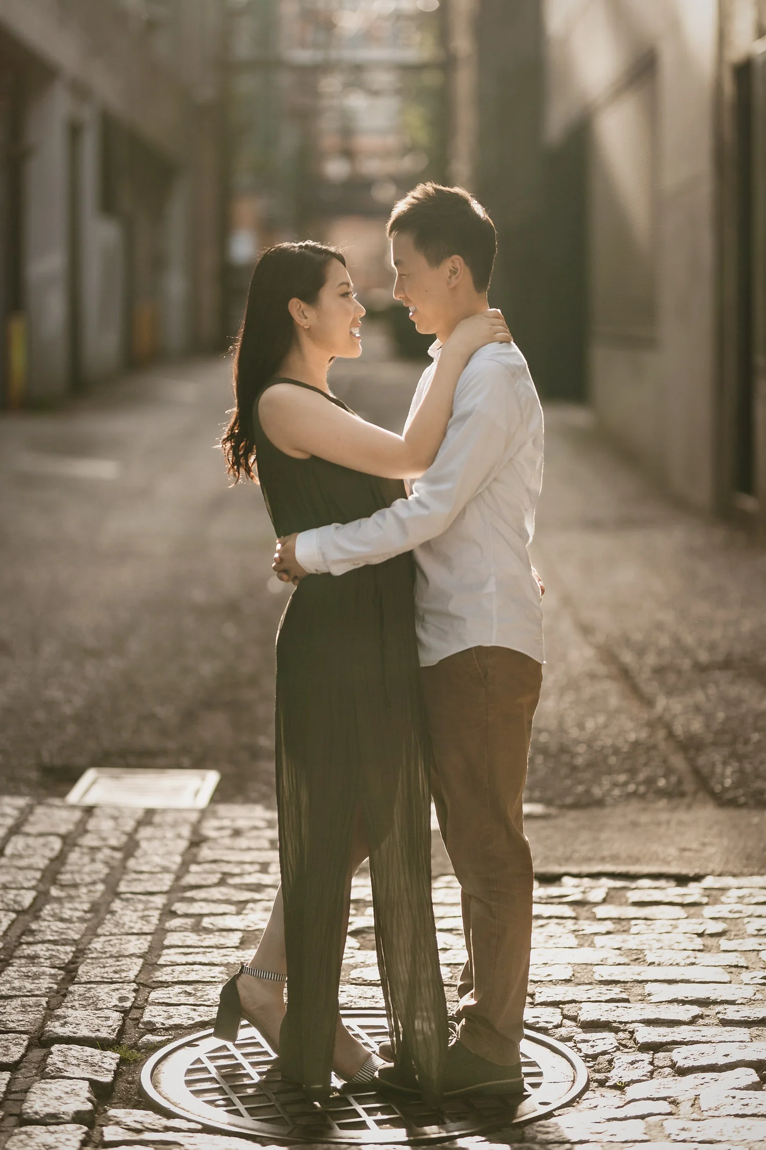 gastown engagement photography in vancouver bc during sunset or golden hour