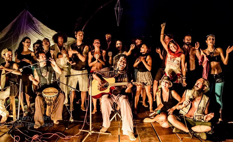 (Photo by Tom Heine, Chinua singing with friends at a charity event in Goa this year)