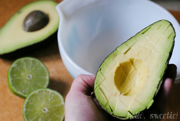 tossing diced avocado in fresh lime juice keeps it bright green