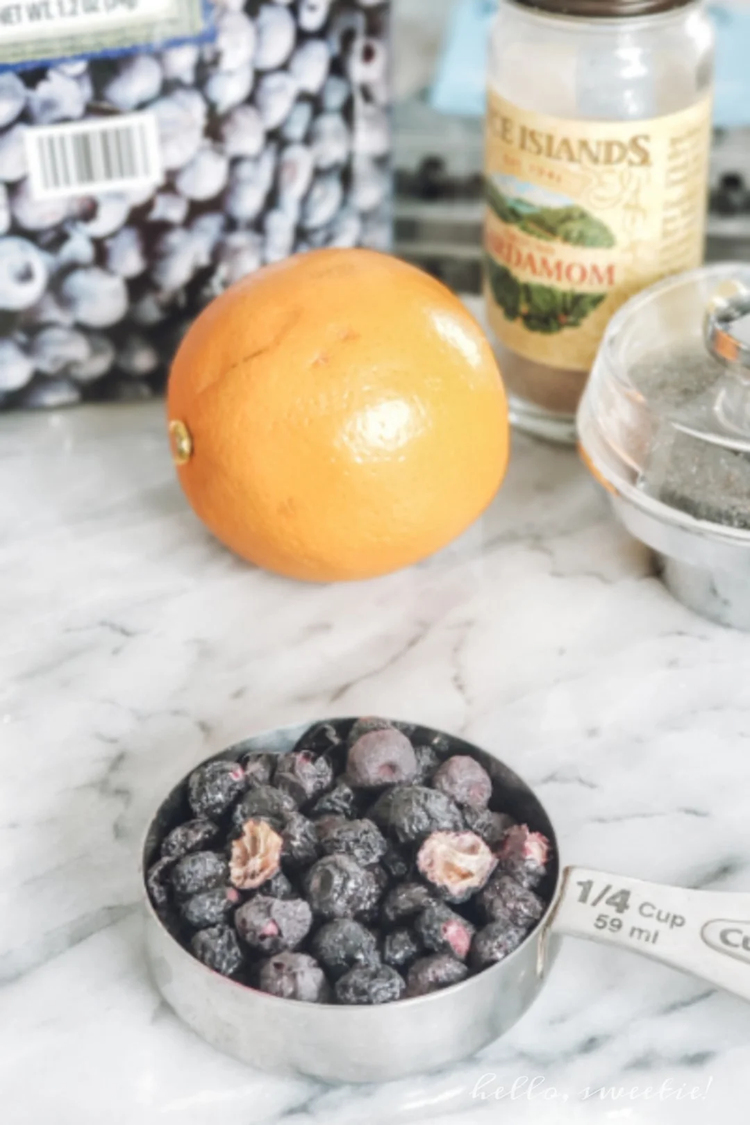 Double blueberry & spiced orange muffins - great flavor from a variety of unexpected ingredients like orange zest, cardamom and freeze dried berries.