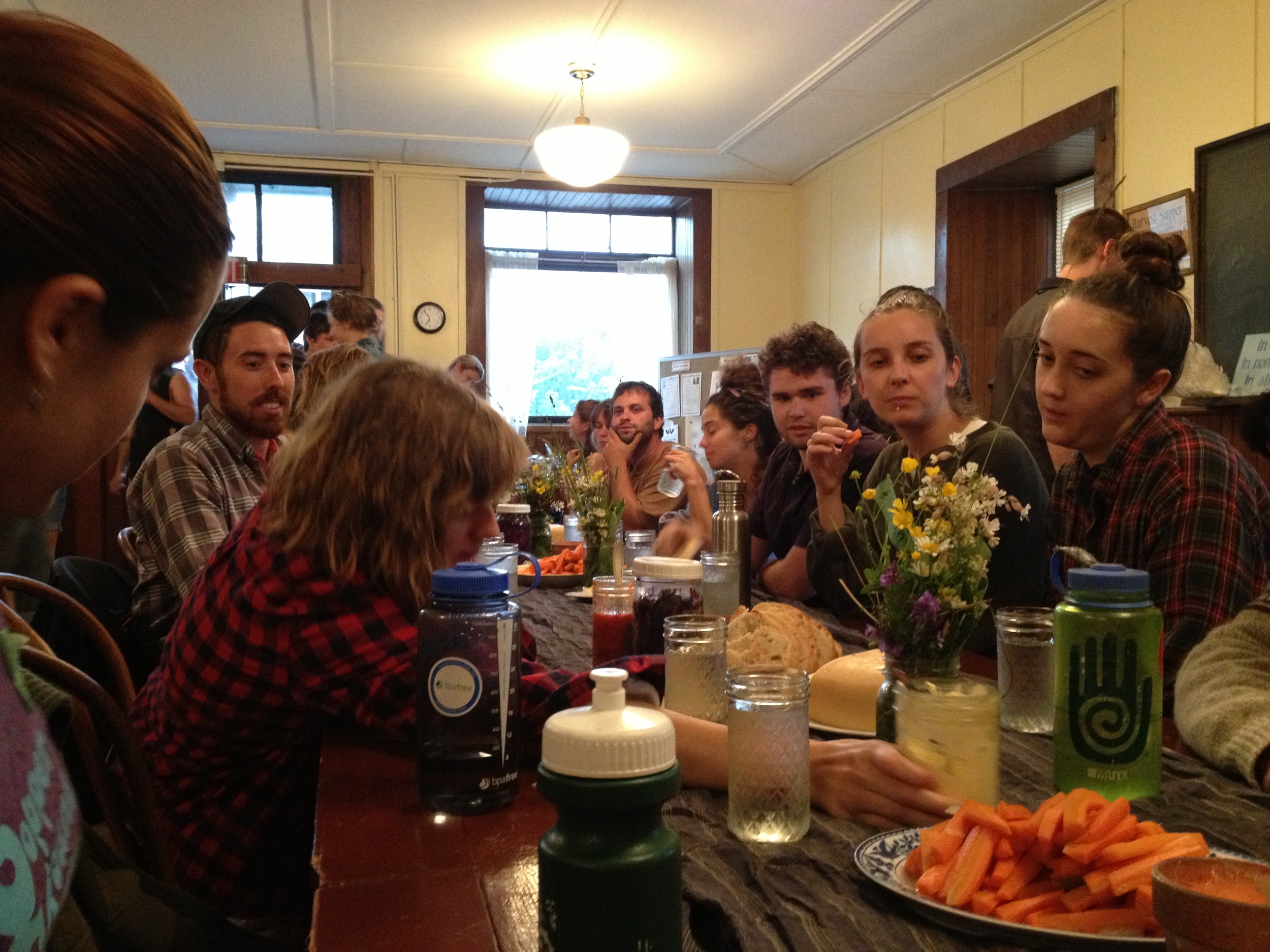  Back downstairs, we gathered for a solstice feast, with food grown by some of the farmers in attendance.  