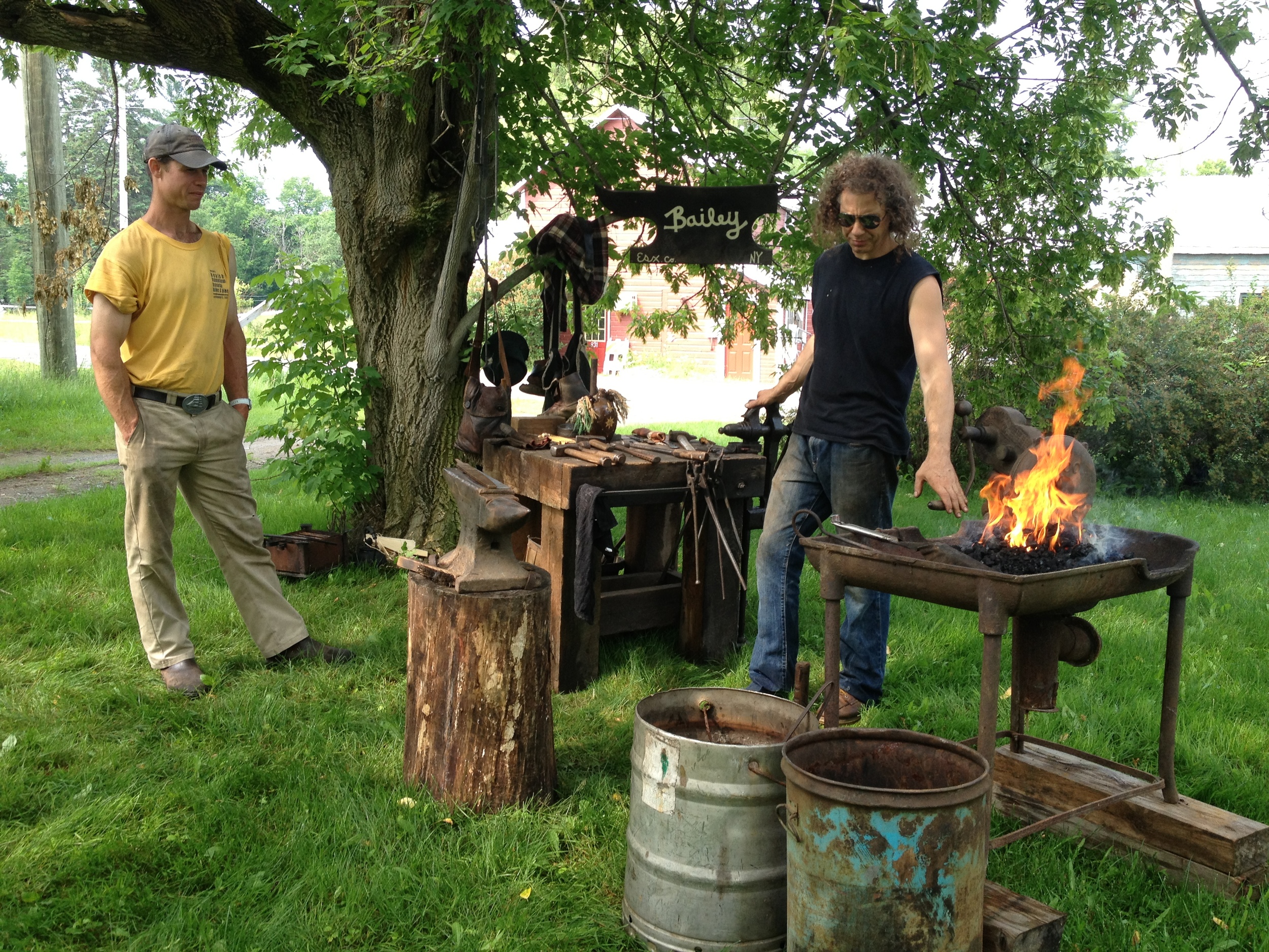  Sated, we split up for some workshops - I chose a blacksmithing demo from Russ, the local blacksmith.  