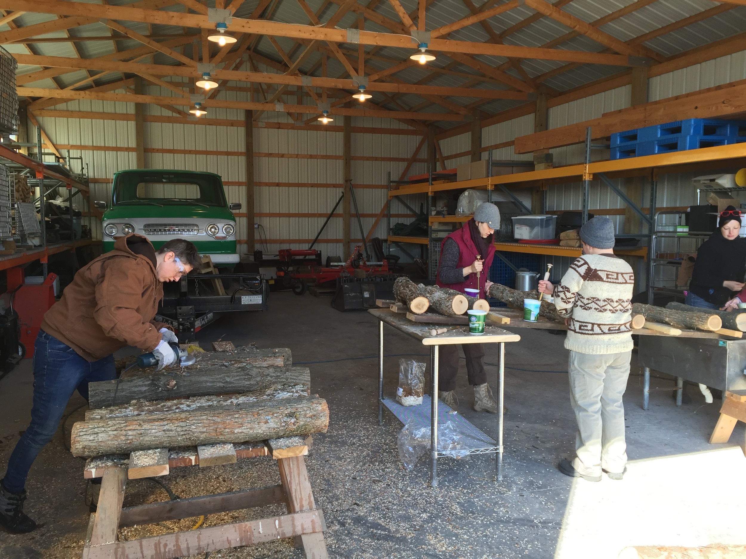  Peggy gets into the drilling groove while the rest of the crew works on filling the holes. 