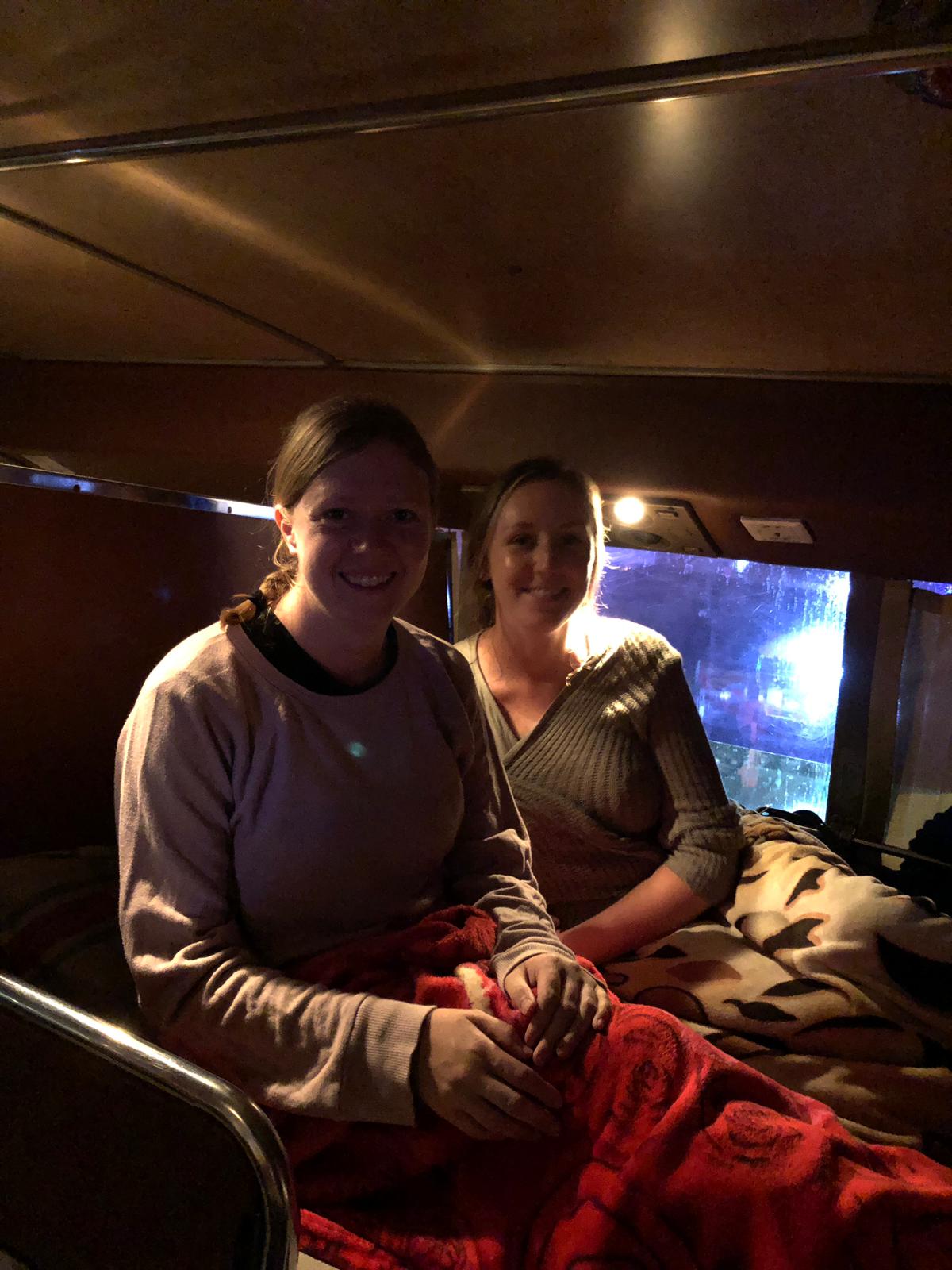 My friend Helen and I with ample room on our very first sleeper bus! This was a fun and hilarious experience to share.