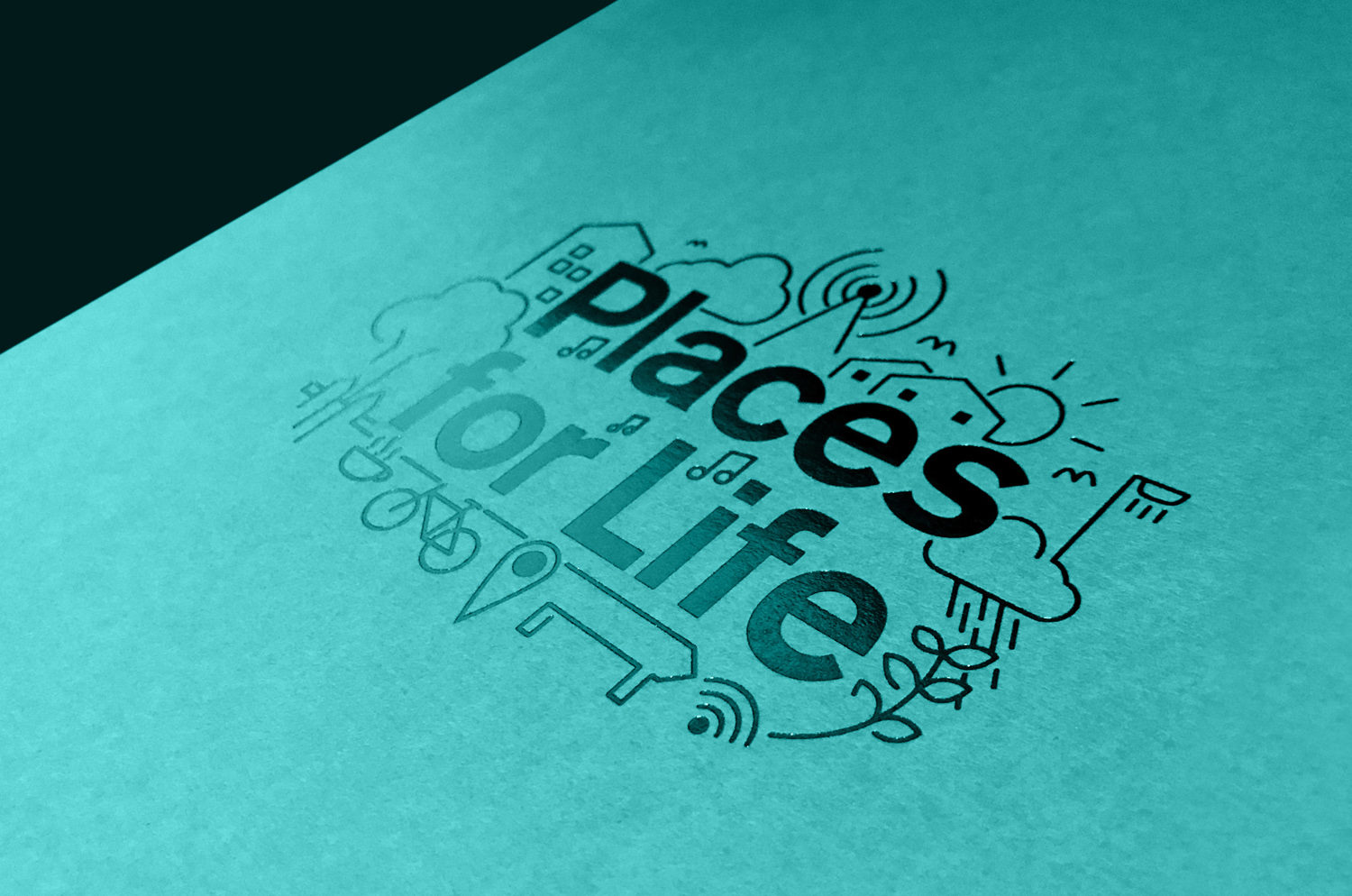 Cover detail: copper foil on uncoated turquoise stock