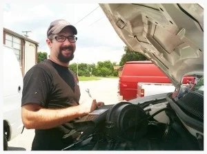 Taylor Maute generously maintains all of the Global Outreach Development vehicles at no cost and uses this opportunity to offer his services to teach other young men the basics of auto mechanics.