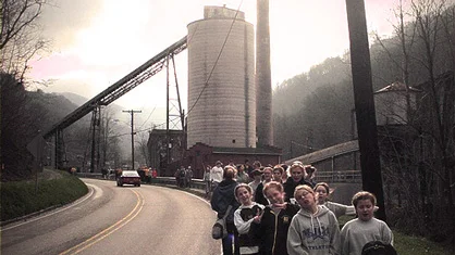 80 Students served in the Tri-Cities in Harlan County, KY in 2003, doing various clean up projects including a public elementary school renovation.
