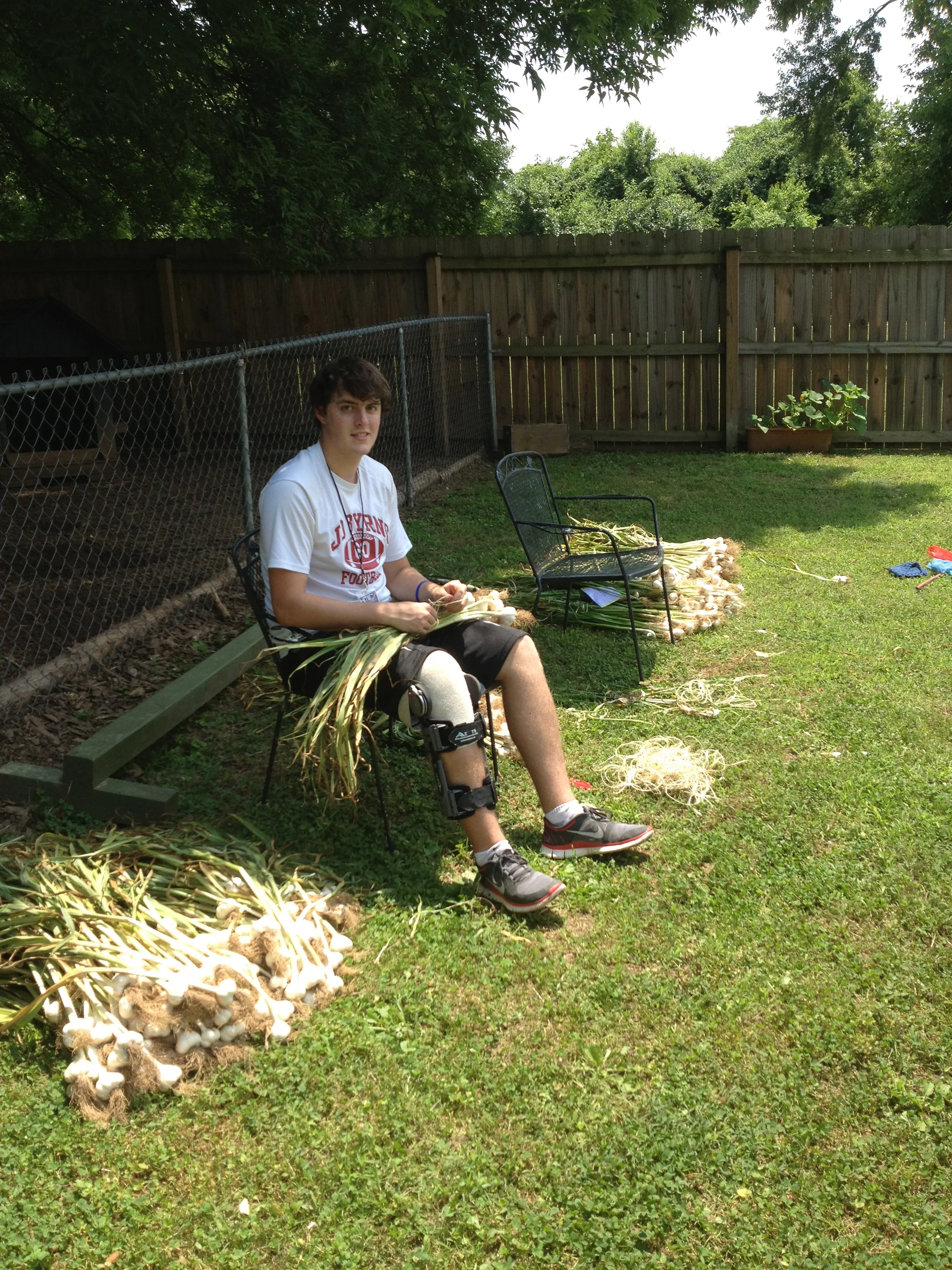 Though Levi couldn't dig in the garden with his peers due to a football injury, he and Seth shared good conversation about the way Jesus reached out to those who found themselves marginalized as a result of injury or sickness.