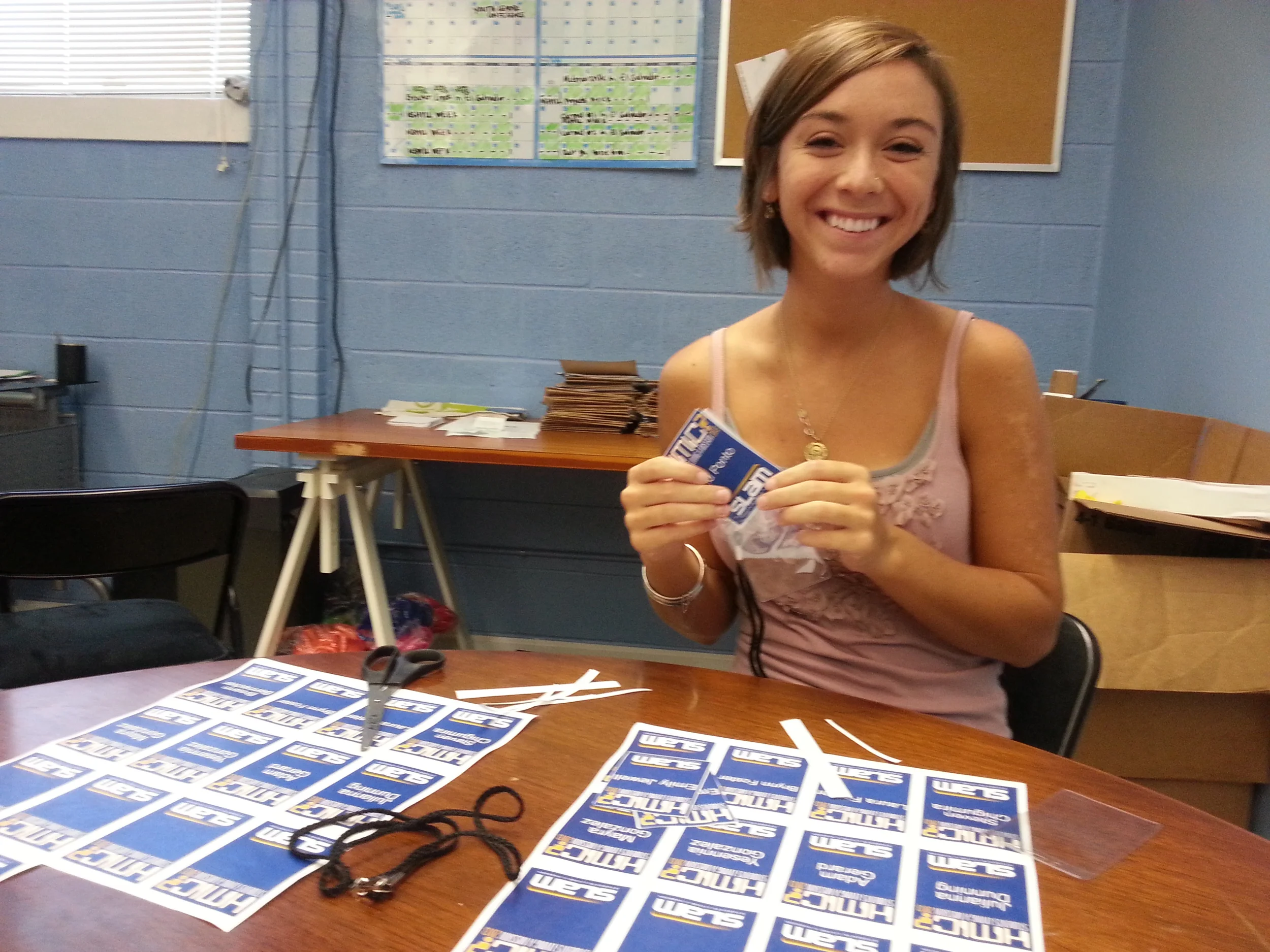 Leah Thress, a regular SLAM volunteer, makes name tags for each of the individuals participating. It's important for us to know each student by name, and for them to be easily identified when they're serving throughout Nashville.