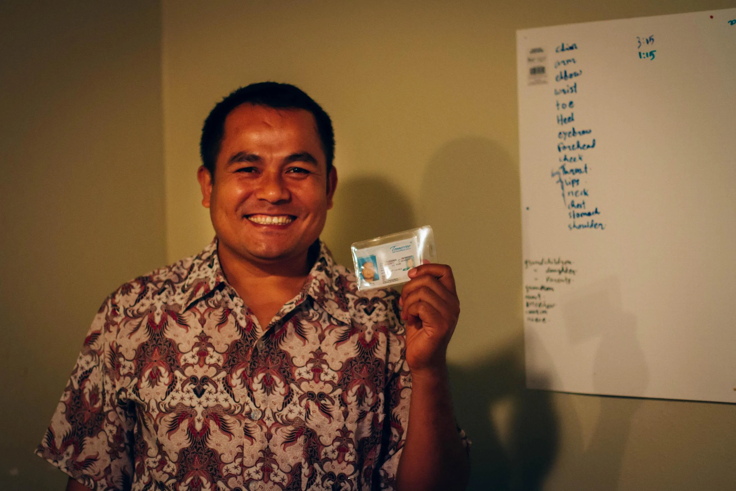 Hia Tin shows off his newly acquired driver's license. This license will make life for his family much easier, and the opportunities available to him in the U.S. much more attainable. 