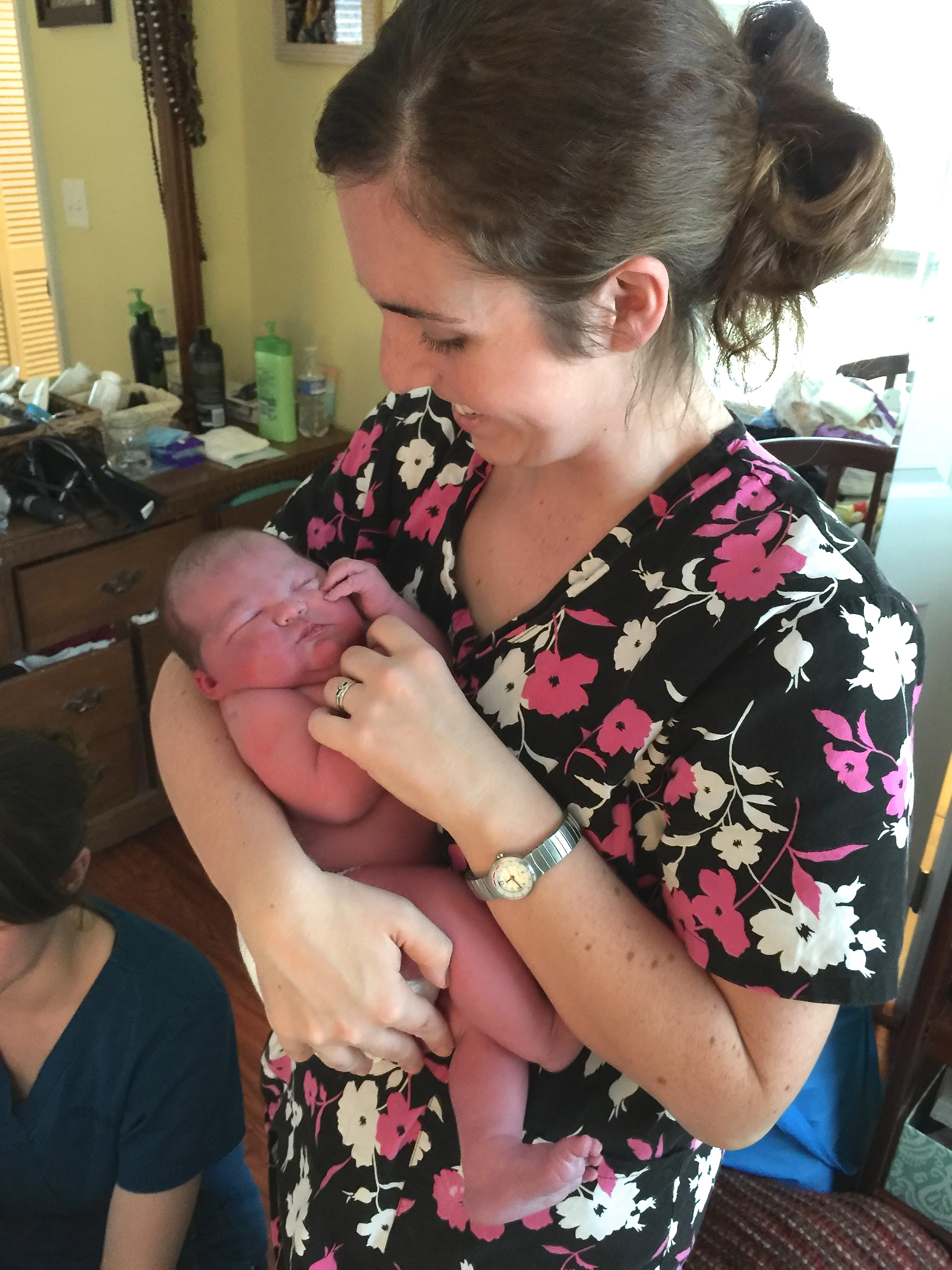Celesta Bargatze is an incredible midwife, whose intelligence and gentle nature puts mothers at ease. Here she holds Elsie Jacqueline. "Jacqueline" is named after a young girl from the Philippines, who has successfully exited the sex slave industry to become a midwife, after being inspired by Meg Mathews (the baby's mother). 
