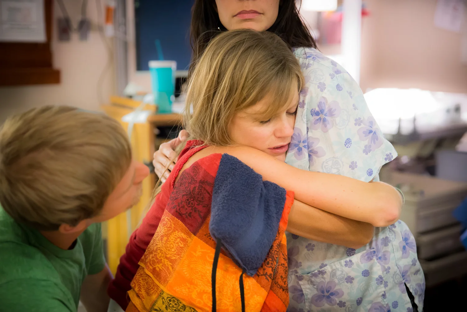 Heather Munoz, CPM, also serves as a monitrice (someone trained in clinical skills related to childbirth as a registered nurse, that can be an advisor for the expectant parents, helping them through the birth process). Here she supports Rylan and Grace Aaseby as they deliver their fourth child. 