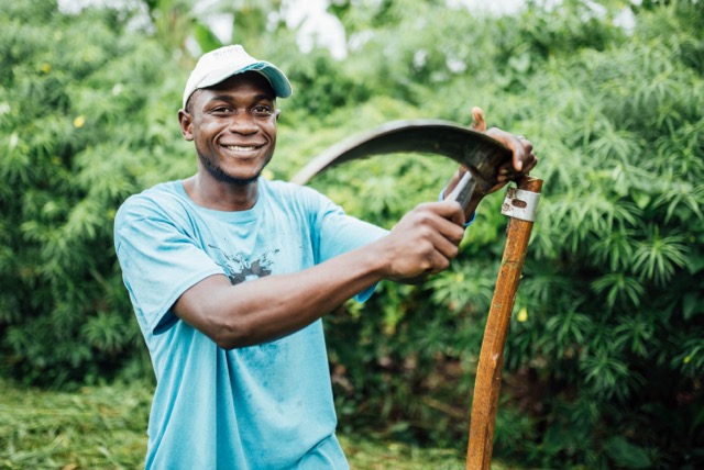 Tom (top) and Andrew (bottom) are two of our students in Uganda, gaining practical skills as well as deepening their knowledge of God's Word. Andrew is holding a scythe, a tool we introduced last summer for slashing the grass on their compound in a faster, easier, and more economical way. 