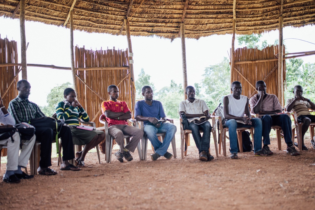 Students from the Institute for G.O.D. International East Africa engage in a group discussion.