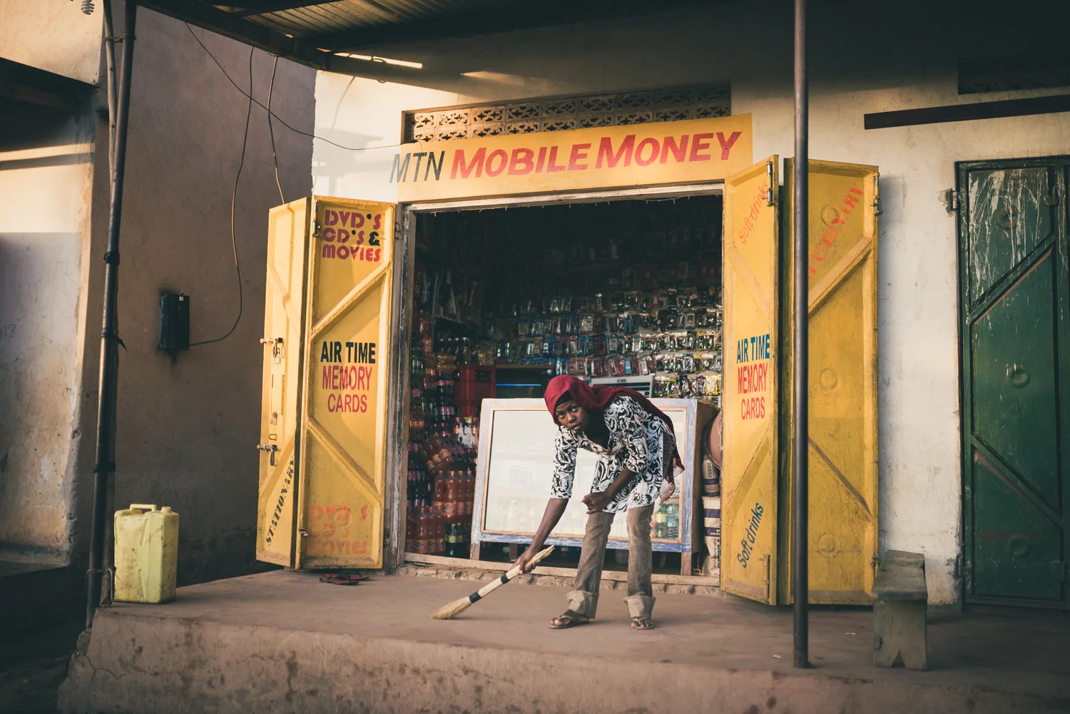 This is one of the shops along the main road running through the town. The attendant was preparing to open it for the day. It's common to see shops like this in Uganda -- one after the other -- all selling very similar, if not the exact same products.